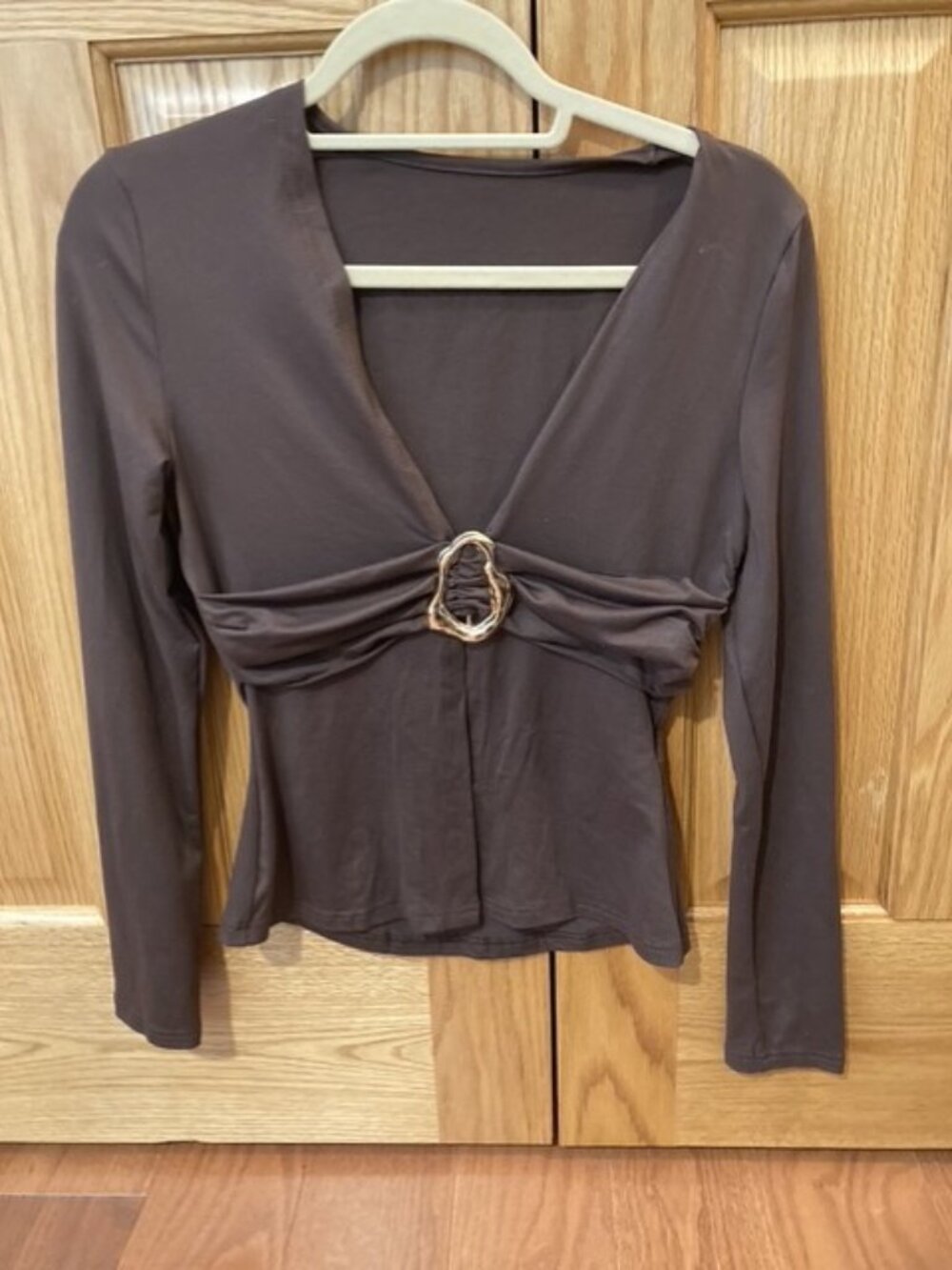 Brown wrap top with gold hardware